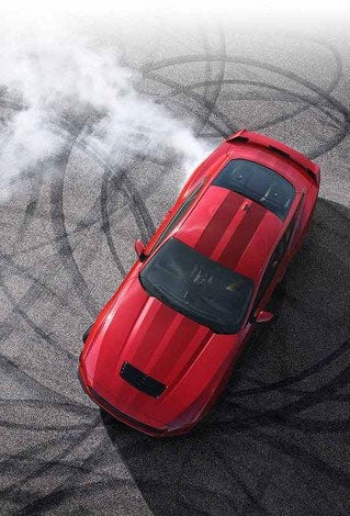 Overhead view of a 2024 Ford Mustang® model with tire tracks on pavement | Bear Lake Motor Company in Montpelier ID