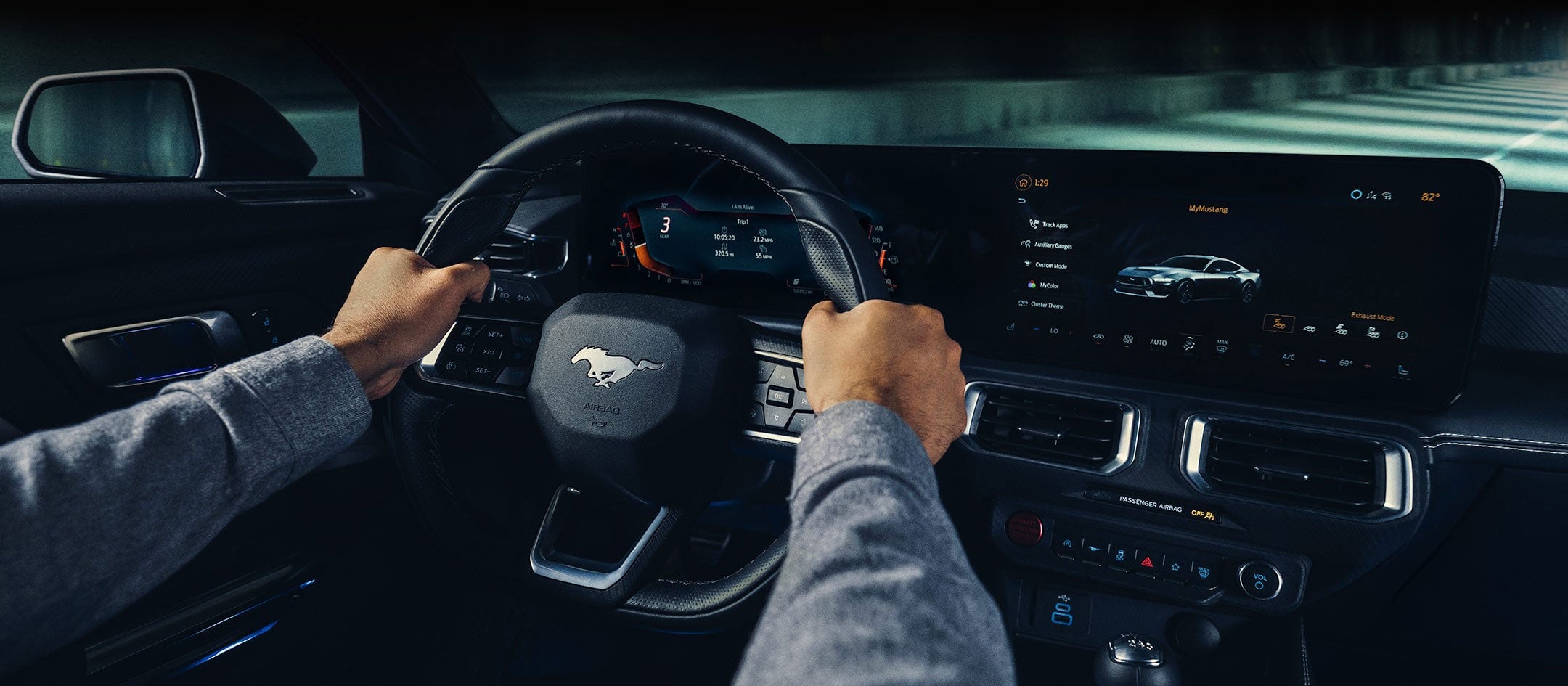 A 2024 Ford Mustang® model interior with a person driving | Bear Lake Motor Company in Montpelier ID
